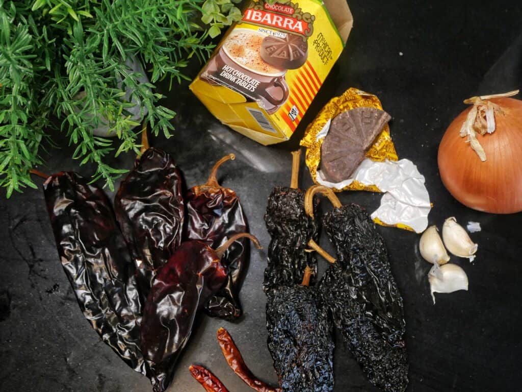 red enchilada sauce ingredients, arbol chilies, guajillo chilies, ancho chilies, mexican chocolate